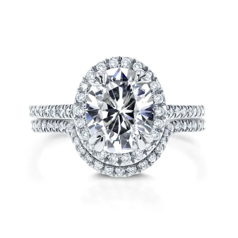 Shop Modern Jewelry Collections With Exclusive Discounts 2-3/5ct.tw Moissanite and Diamond Oval Halo Bridal Set Shop Modern Jewelry Collections With Exclusive Discounts 2-3/5ct.tw Moissanite and Diamond Oval Halo Bridal Set