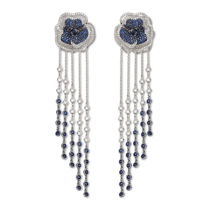 Shop Jewelry That Shines Without The High Price Bloom Medium Flower Halo Blue Sapphire Long Earrings in White Gold Shop Jewelry That Shines Without The High Price Bloom Medium Flower Halo Blue Sapphire Long Earrings in White Gold