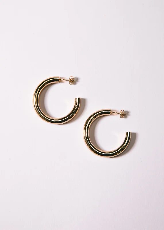 Elevate Your Outfit With Discounted Statement Jewelry Large Tube Hoops